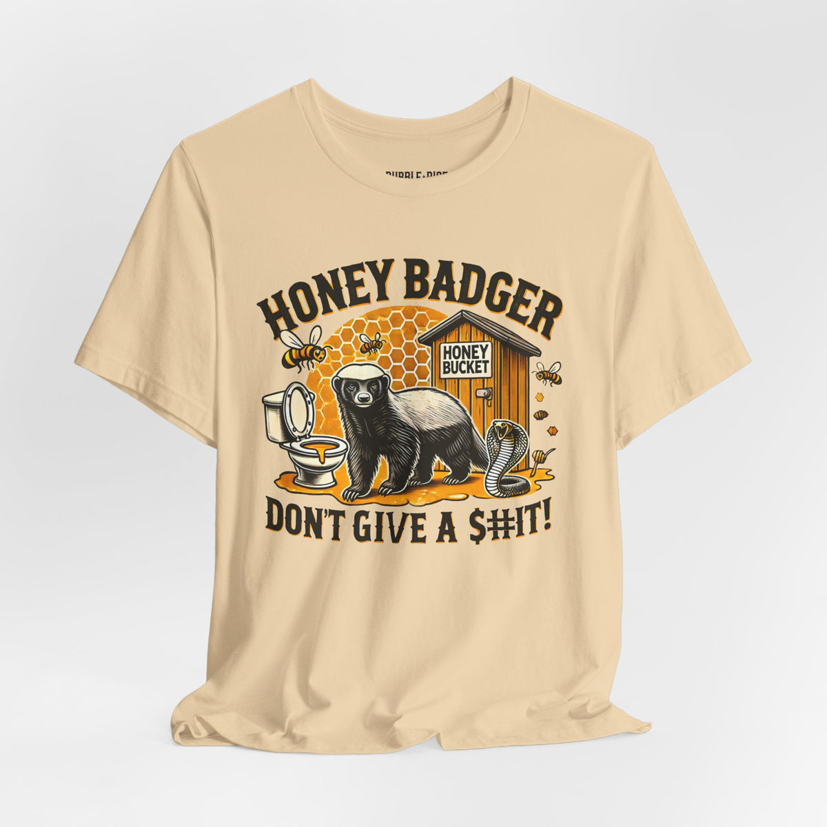 Honey Badger Don't Give a $h!t t-shirt in soft cream